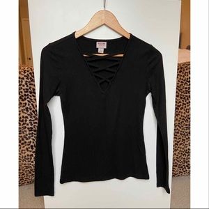 Black long sleeve v neck with criss cross front